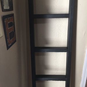 Solid black blanket throw ladder